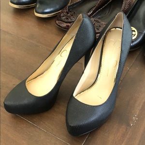 Black leather platform pumps